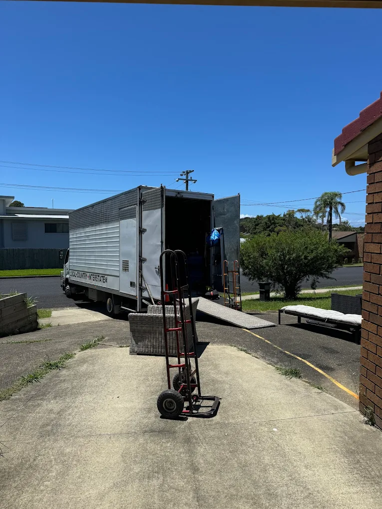 Loading from the rear at a customer's removal job
